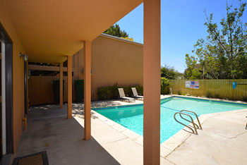 Ponderosa apartments pool area shaded patio deck